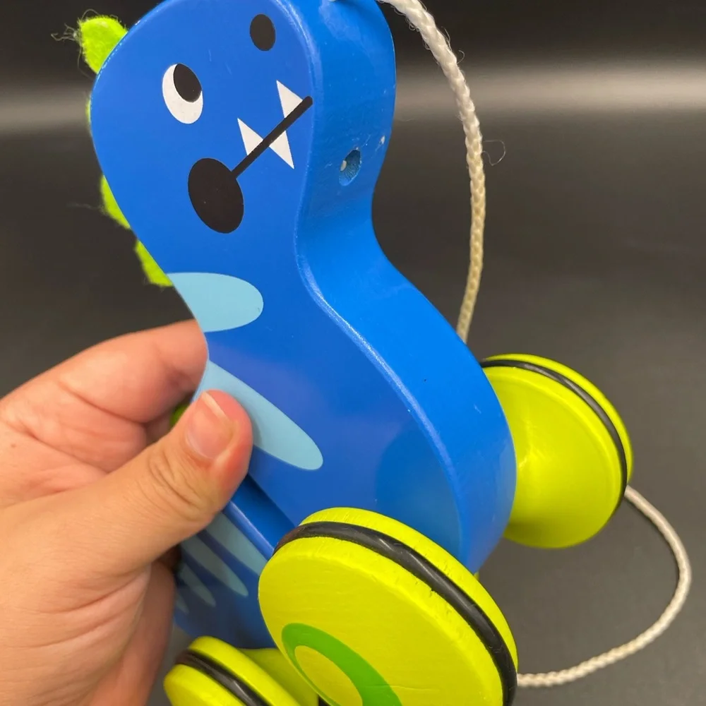 Cossy wooden Dinosaur pull along wooden Toys